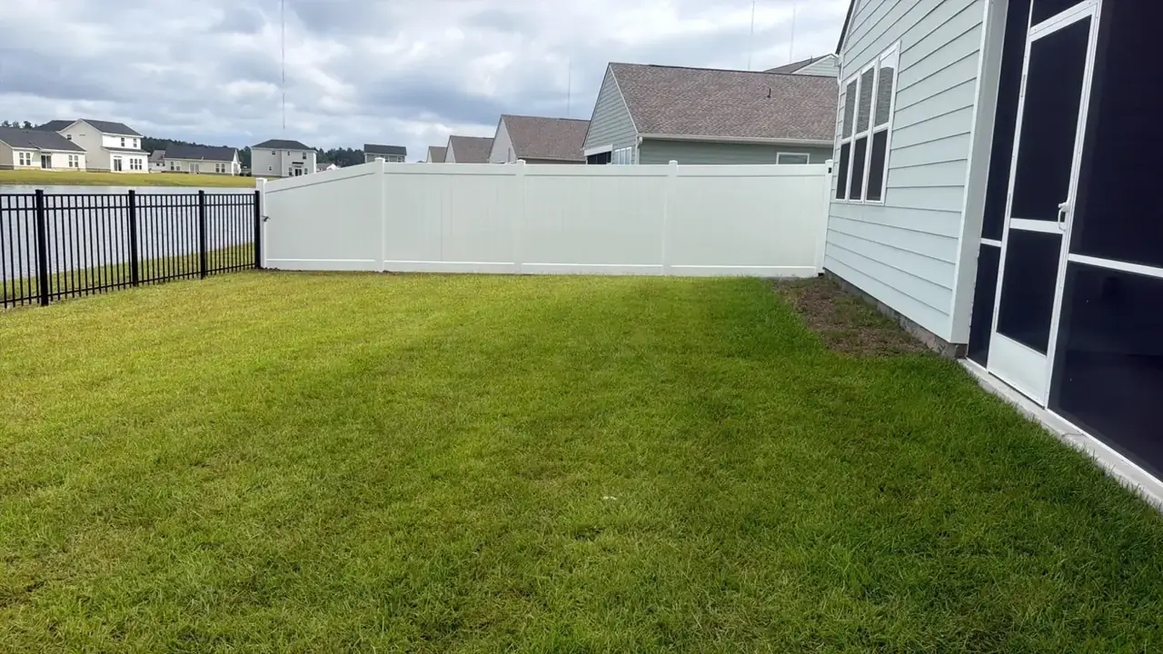 Vinyl and aluminum backyard fence