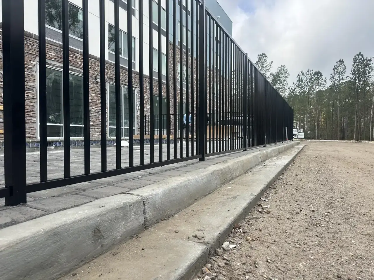 Commercial black metal fence