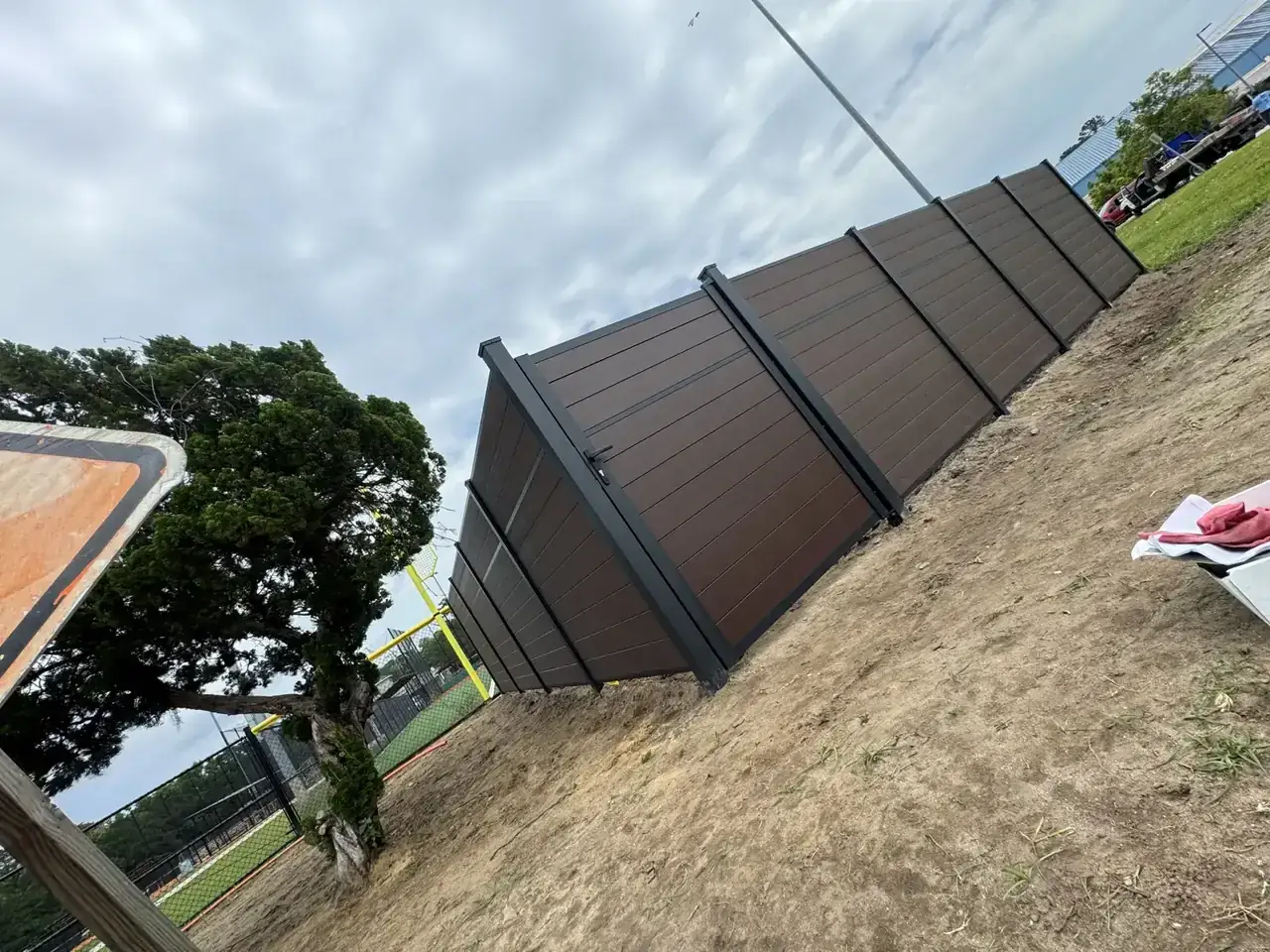Greenwood Fence Systems — Brown privacy fence